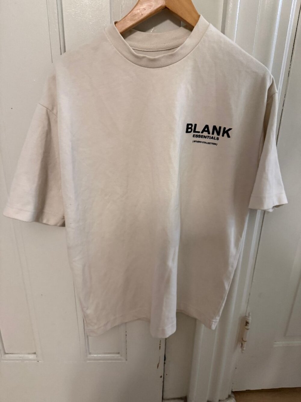 Blank Essentials off white tshirt size adult S